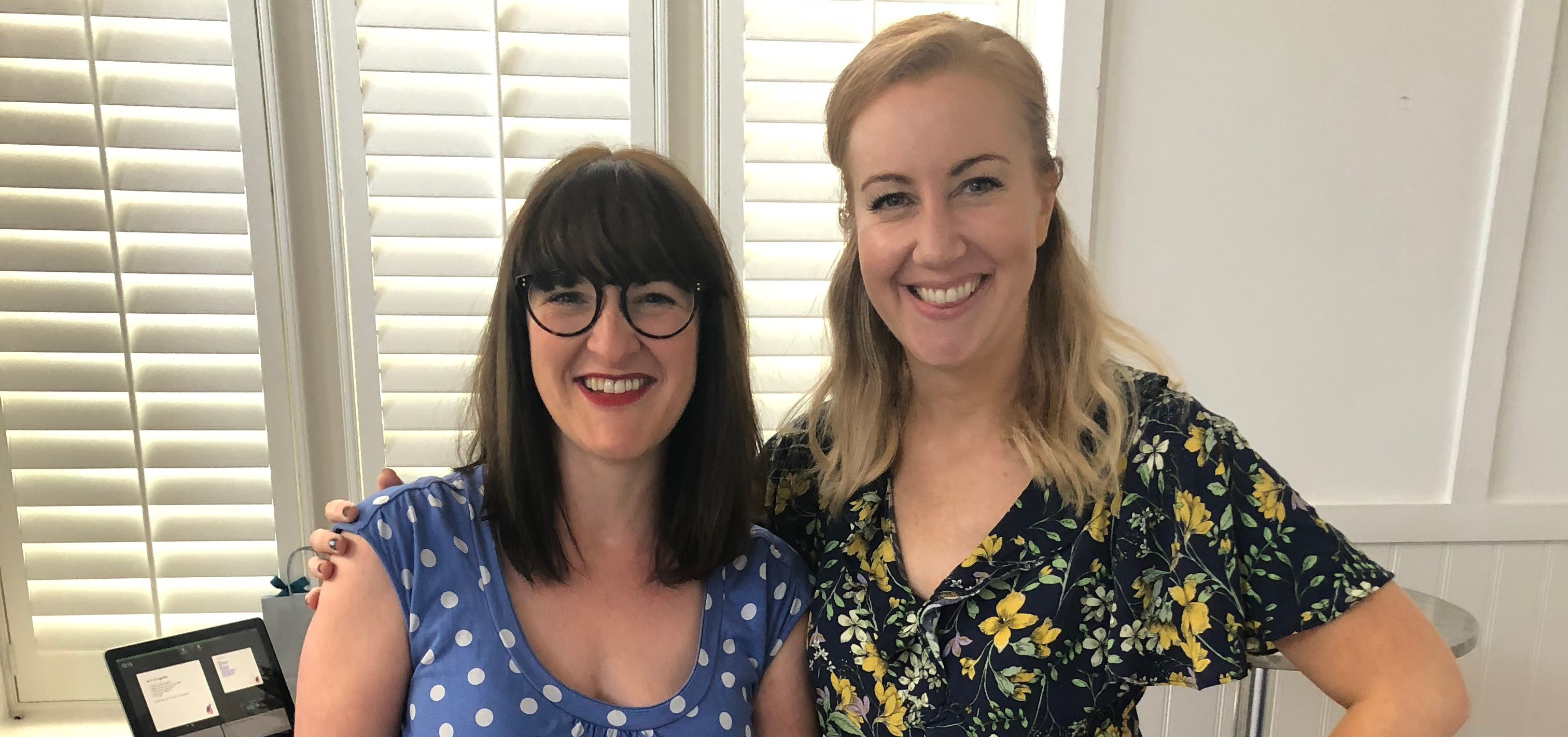 Janine Coombes standing with Helen Packham